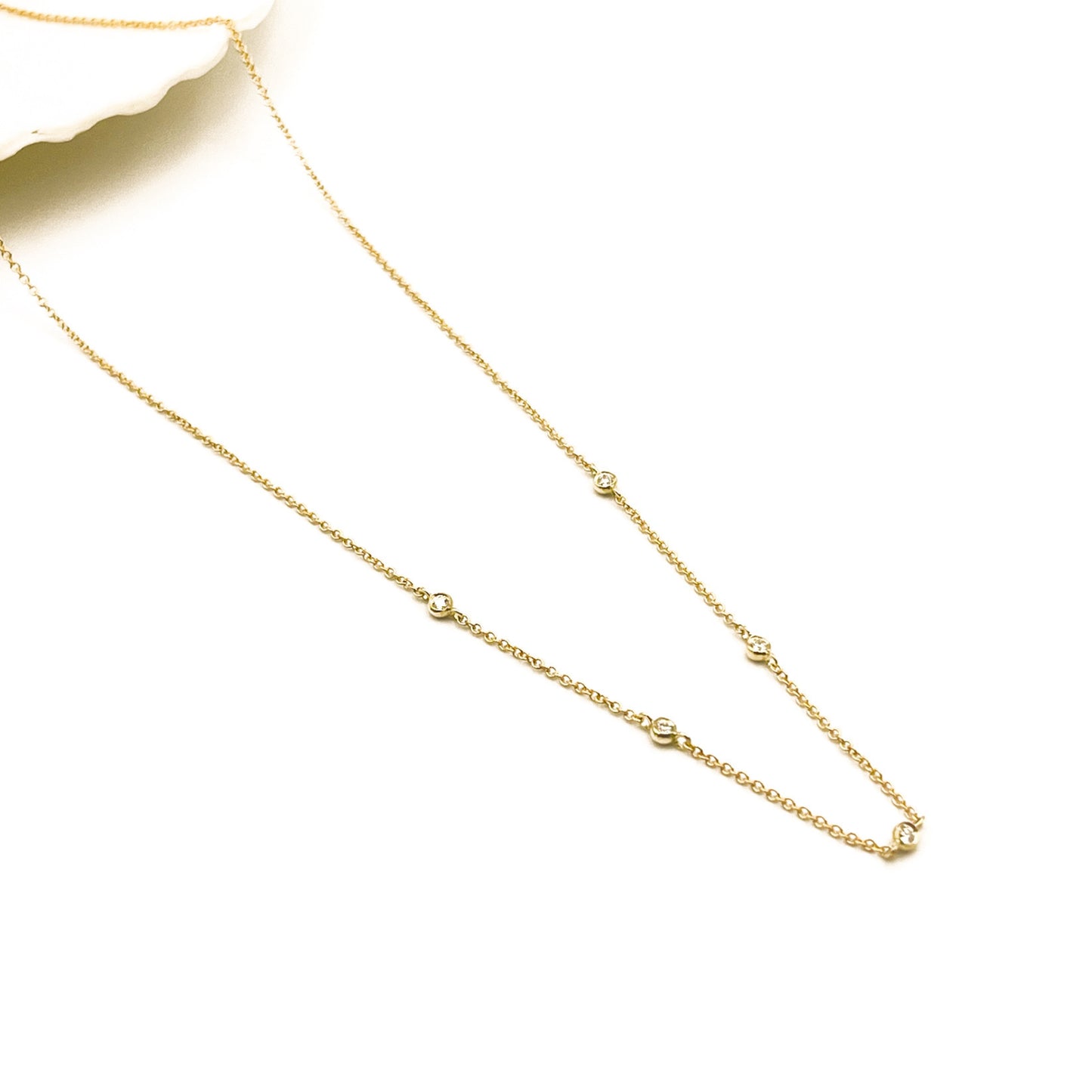 tiny moments 9ct yellow gold and white diamond necklace by Thor Collective