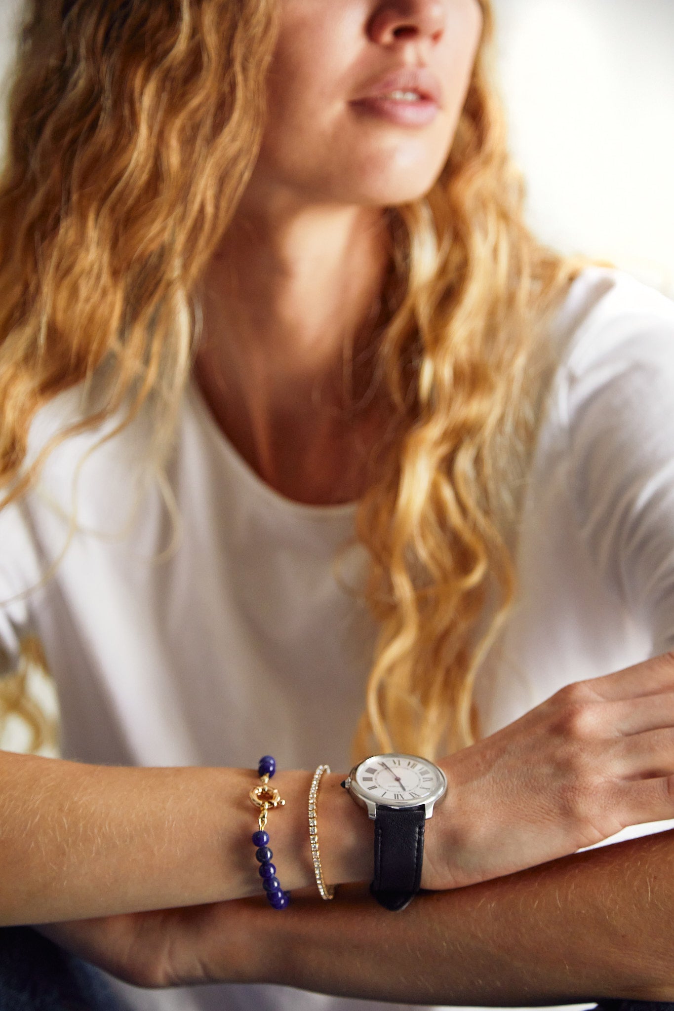 9ct gold diamond tennis bracelet styled with a classic watch by Thor Collective.