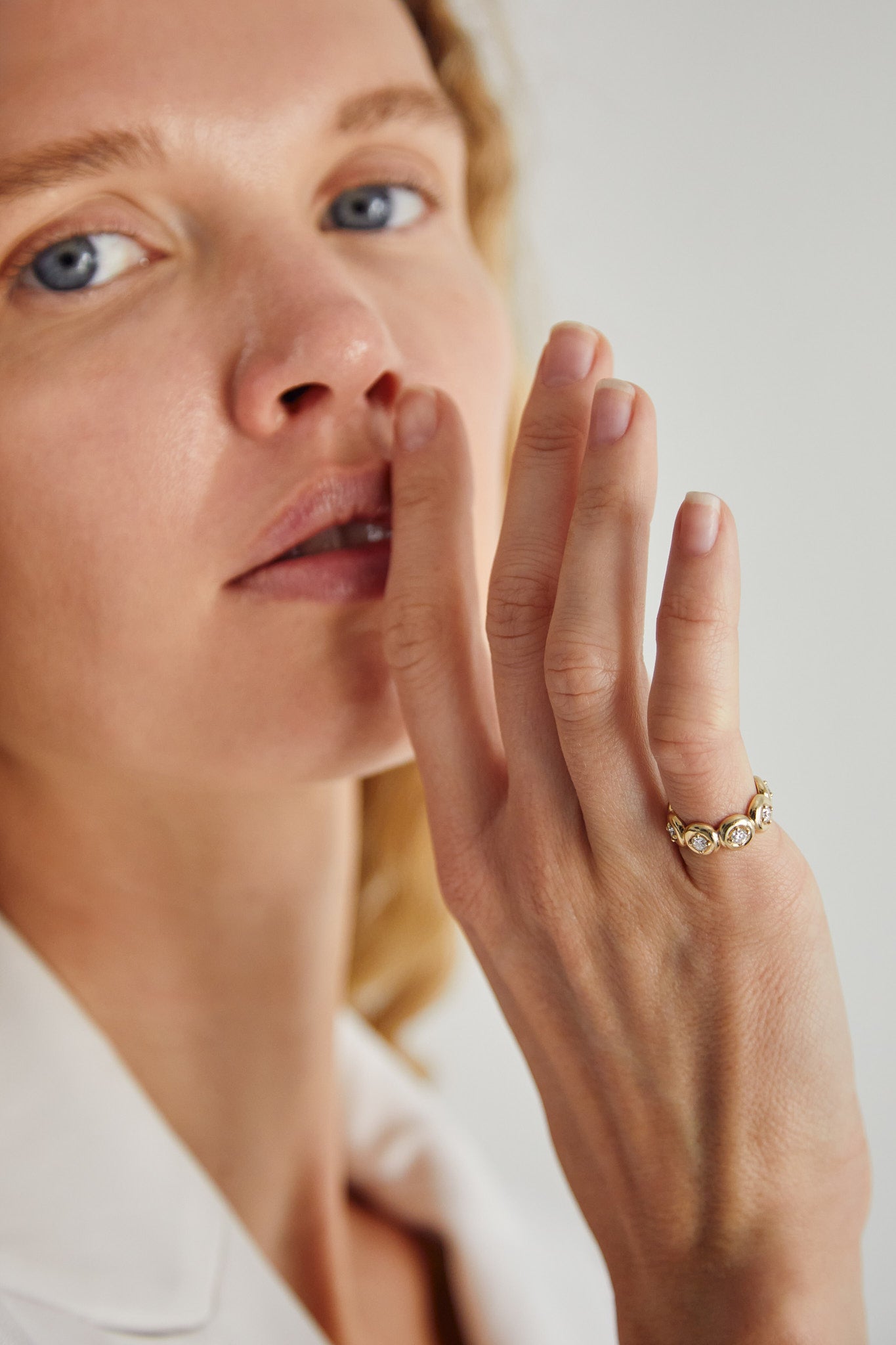 Woman wearing Thor Collective’s 9ct gold bezel diamond ring