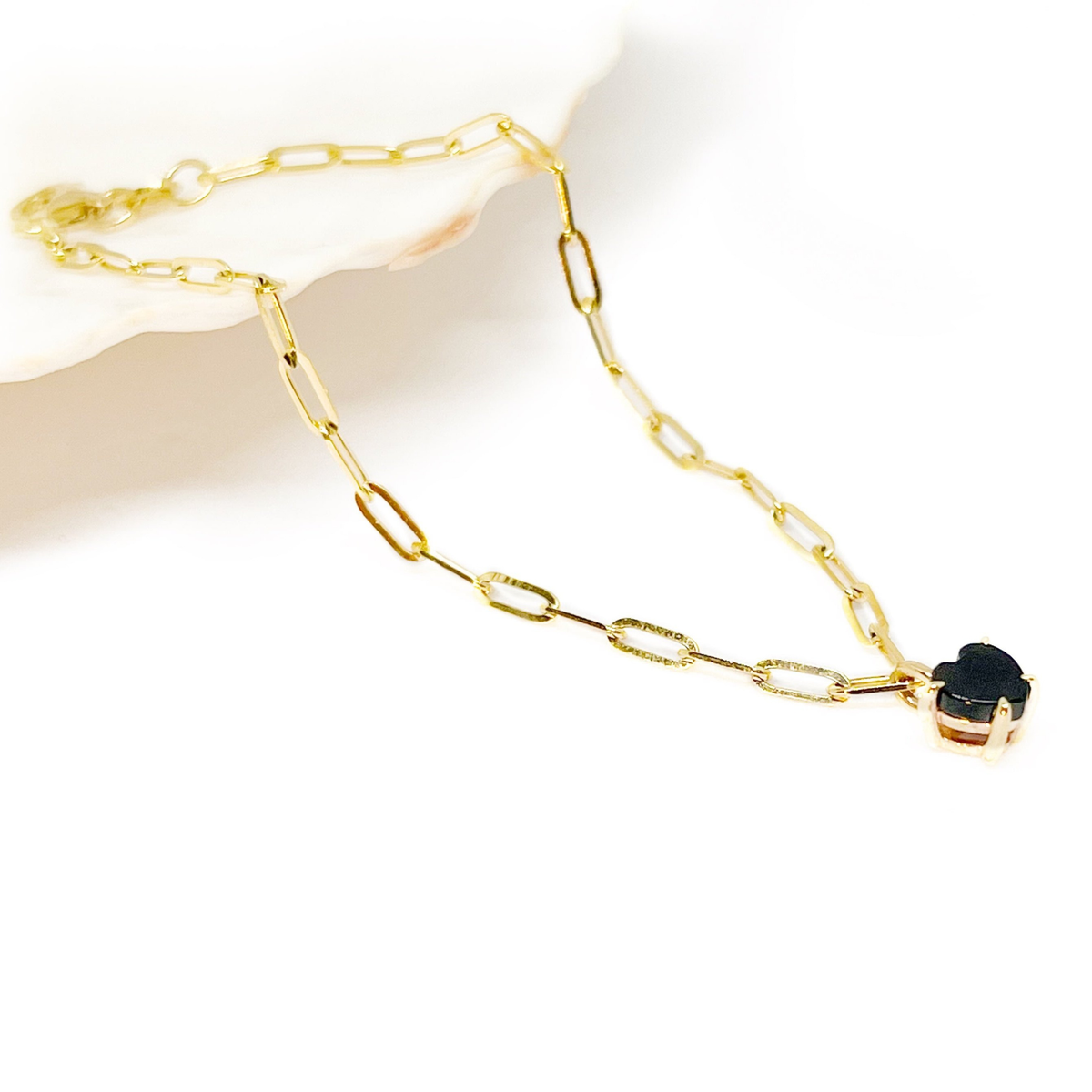 19cm solid 9ct gold paperclip bracelet with a 5mm heart-cut black spinel gemstone