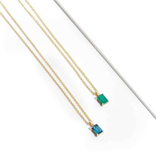7x5mm London Blue Topaz baguette pendant set in 9ct solid gold