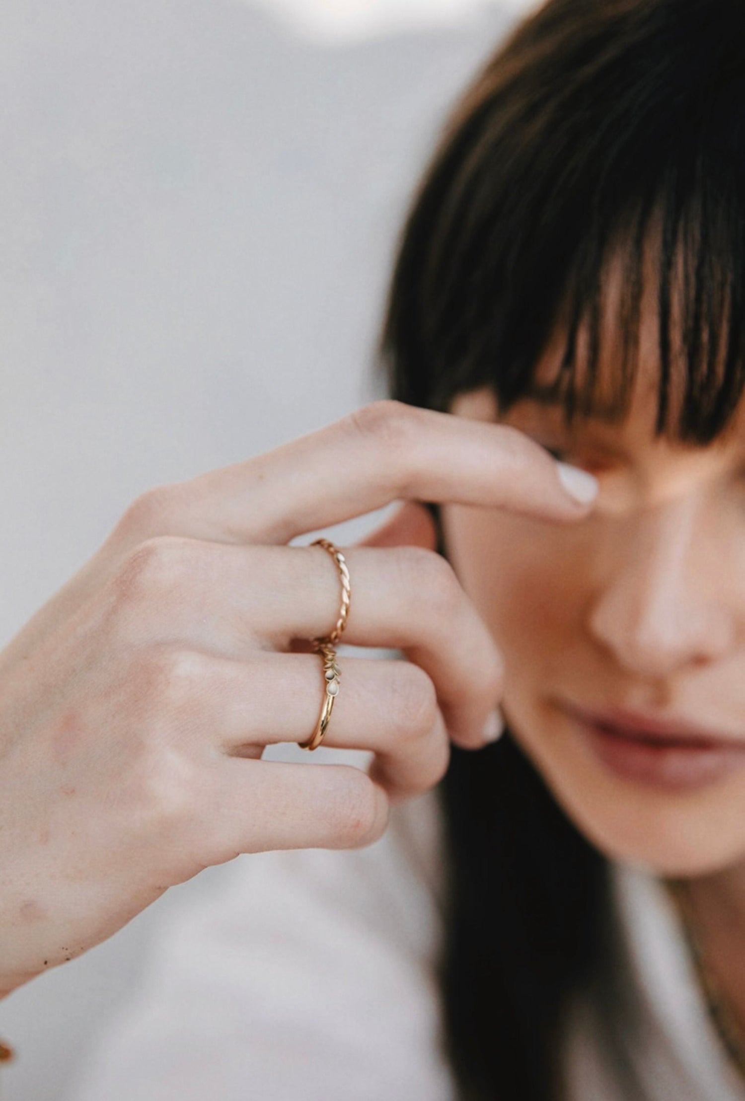 9ct gold plaited rings on hand 
