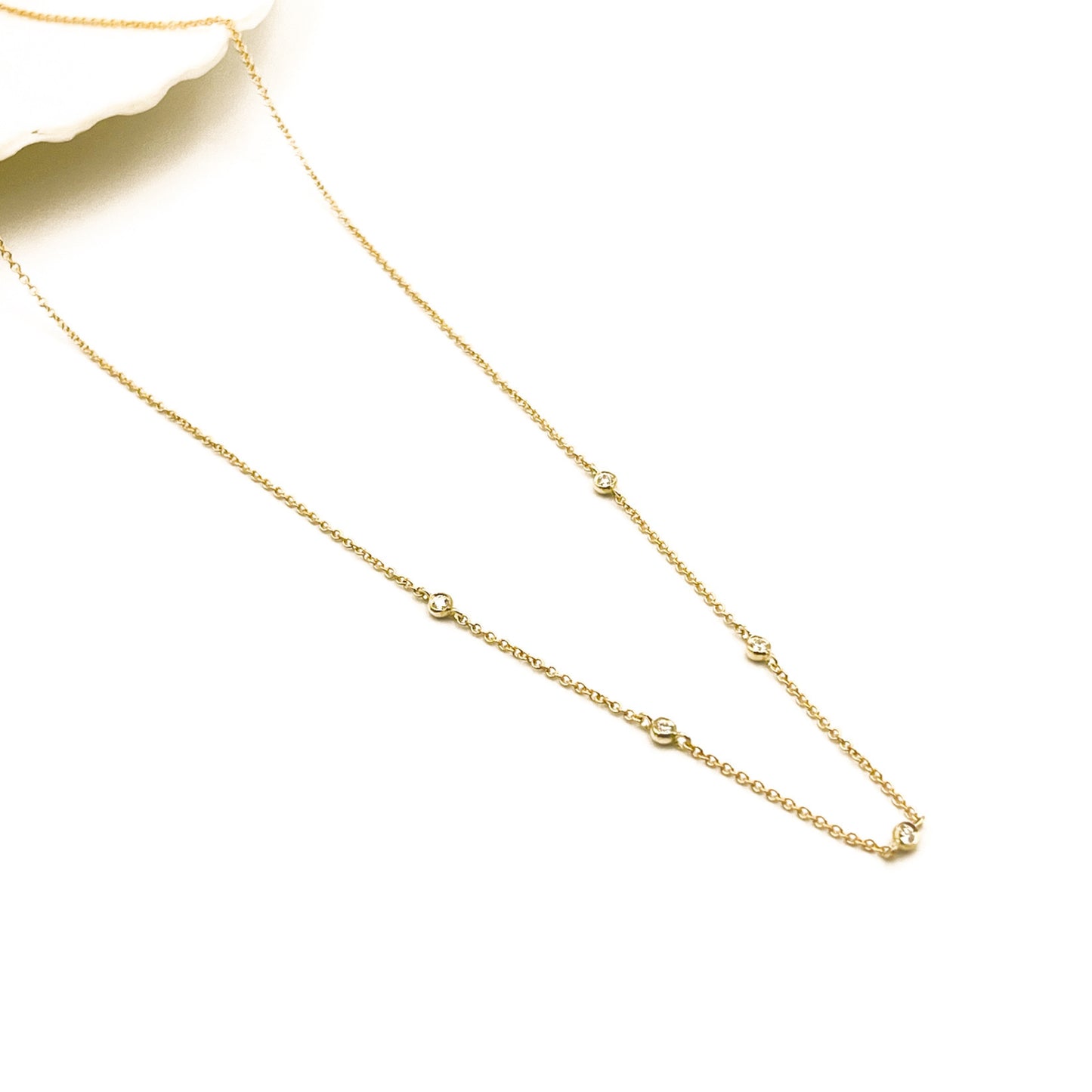 tiny moments 9ct yellow gold and white diamond necklace by Thor Collective 