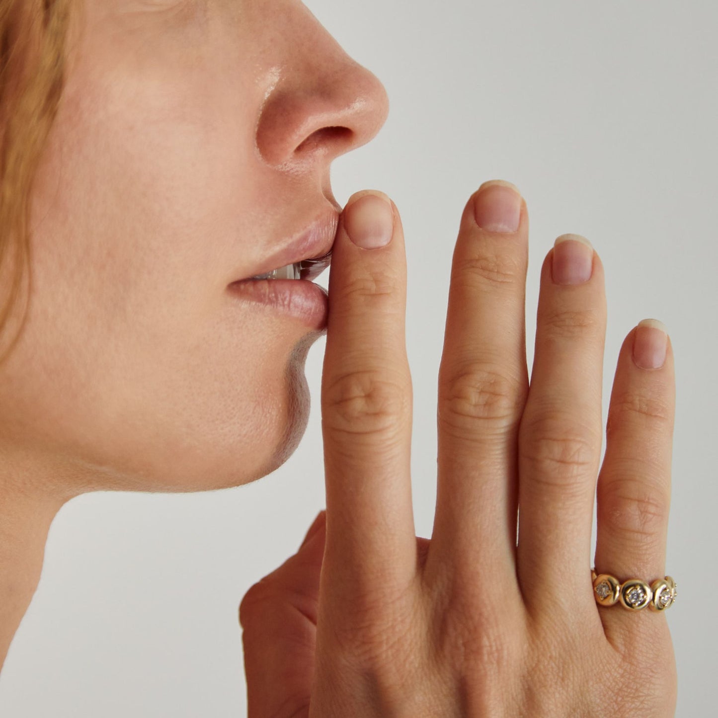 Yellow gold eternity ring with bezel-set lab grown diamonds