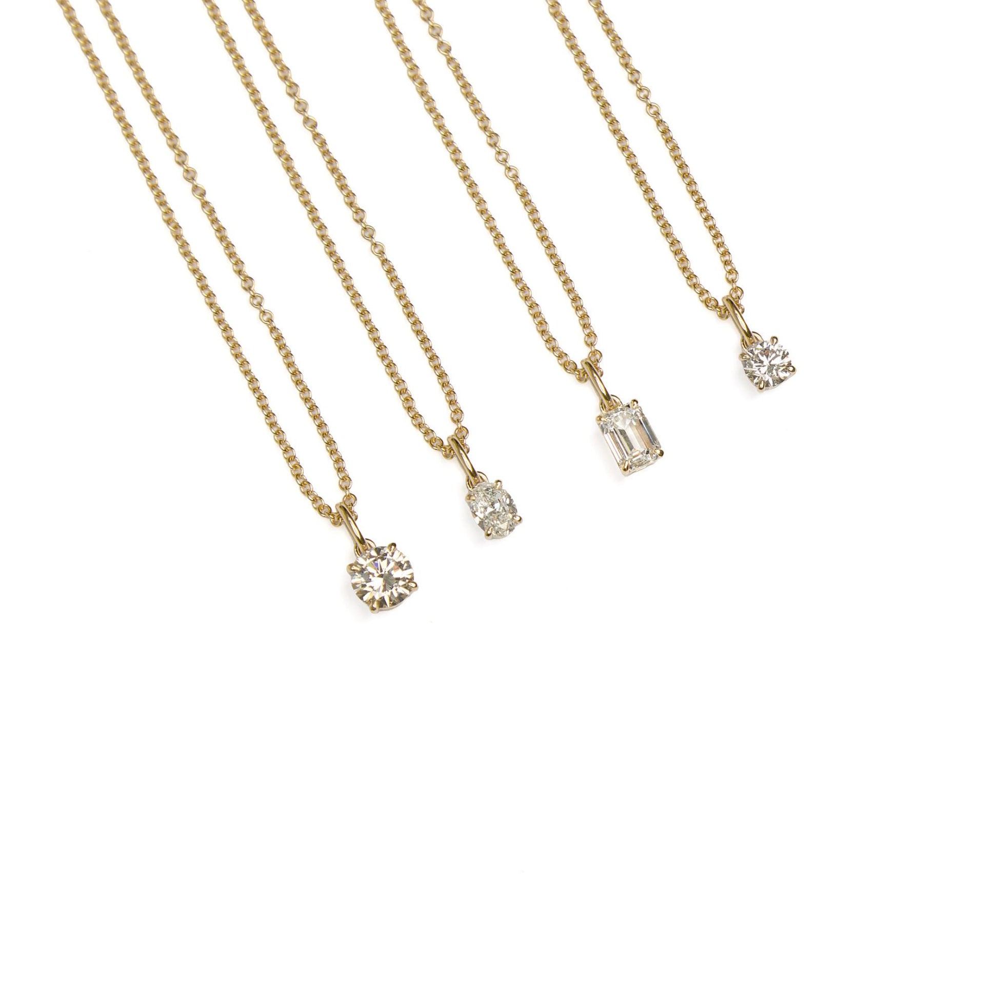 Lab grown diamond pendant collection with round, oval and emerald cut pendants in 9ct gold