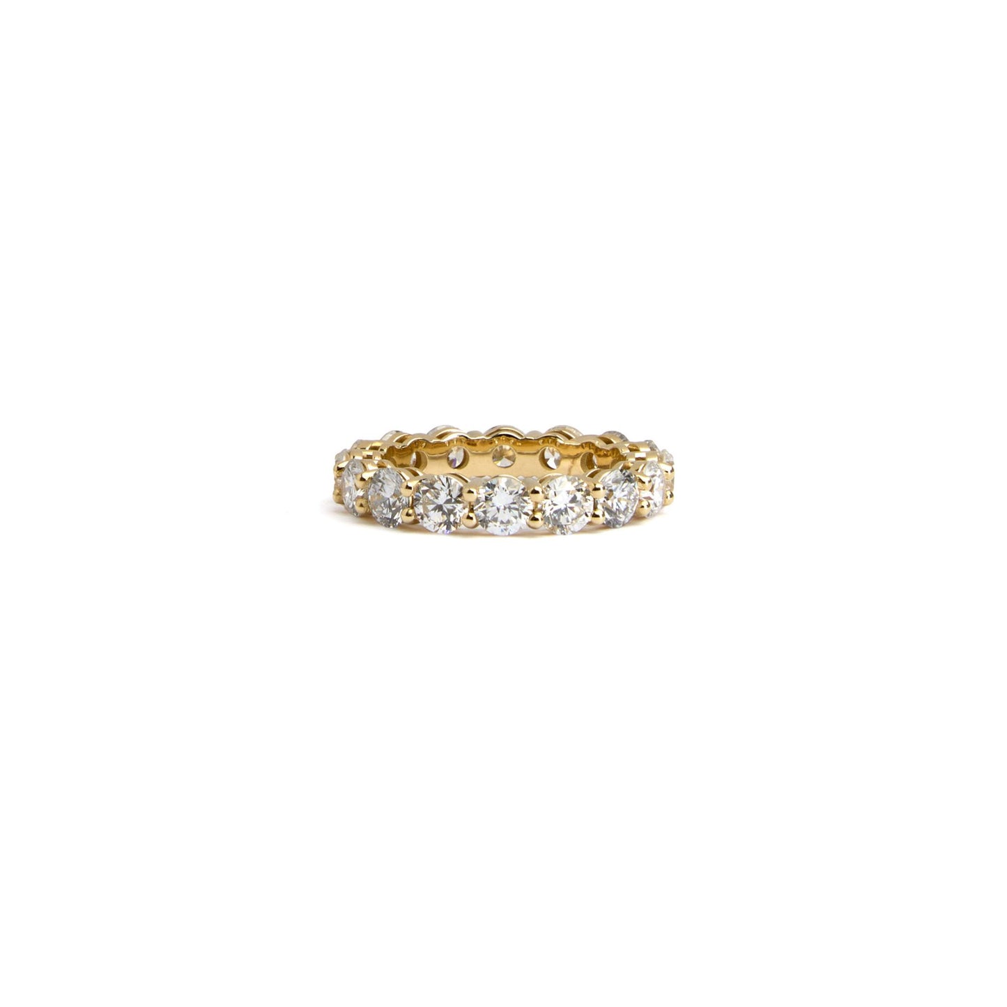 Round lab grown diamond eternity ring in solid 9ct yellow gold on white background