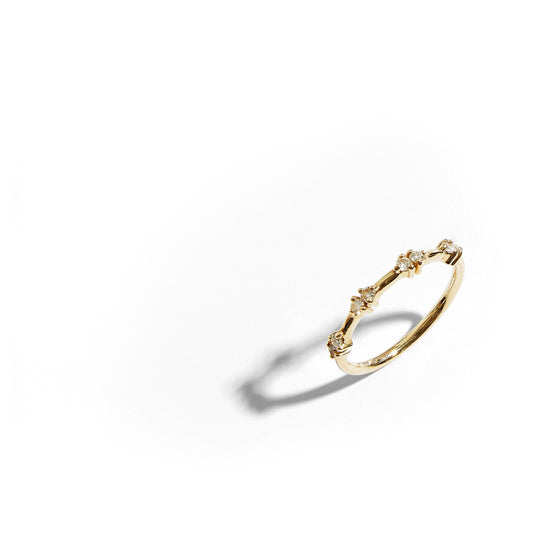 Natural diamond band ring in 9ct yellow gold on white background