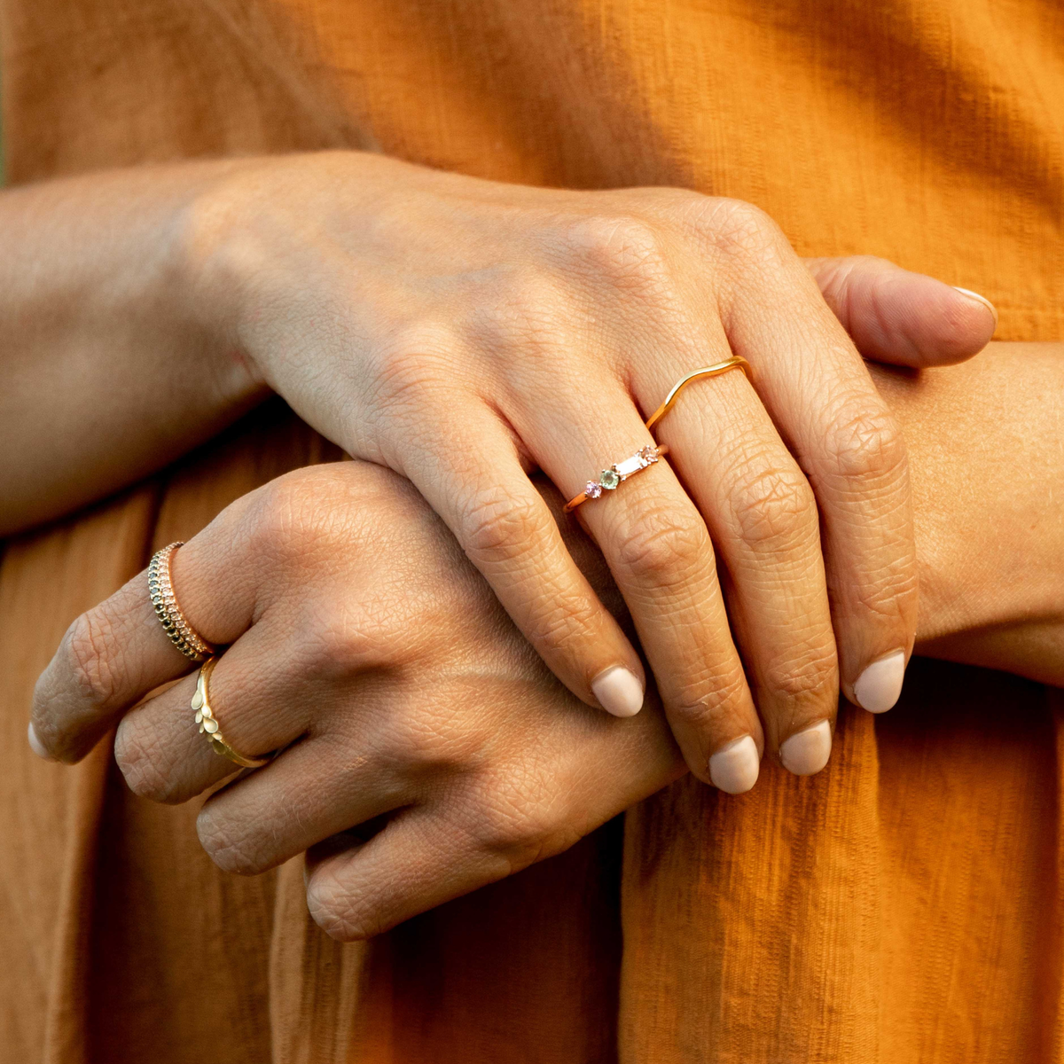 Blush Ring in 9ct rose gold with peach tourmaline, morganite and green tourmalines worn on the hand