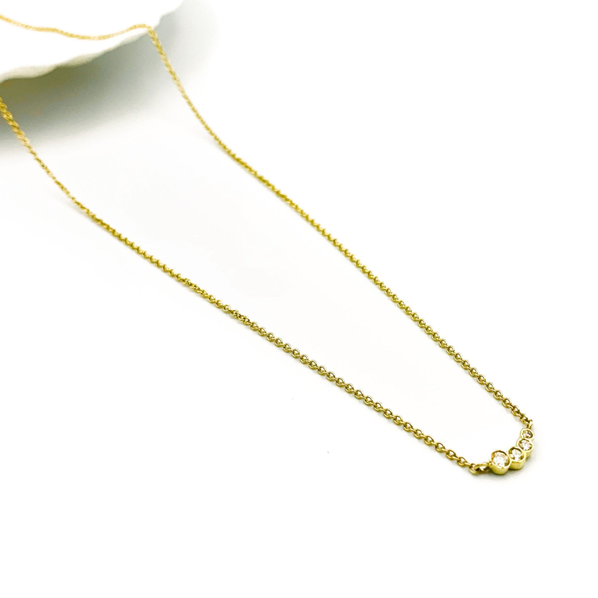 Diamond charm yellow gold necklace  