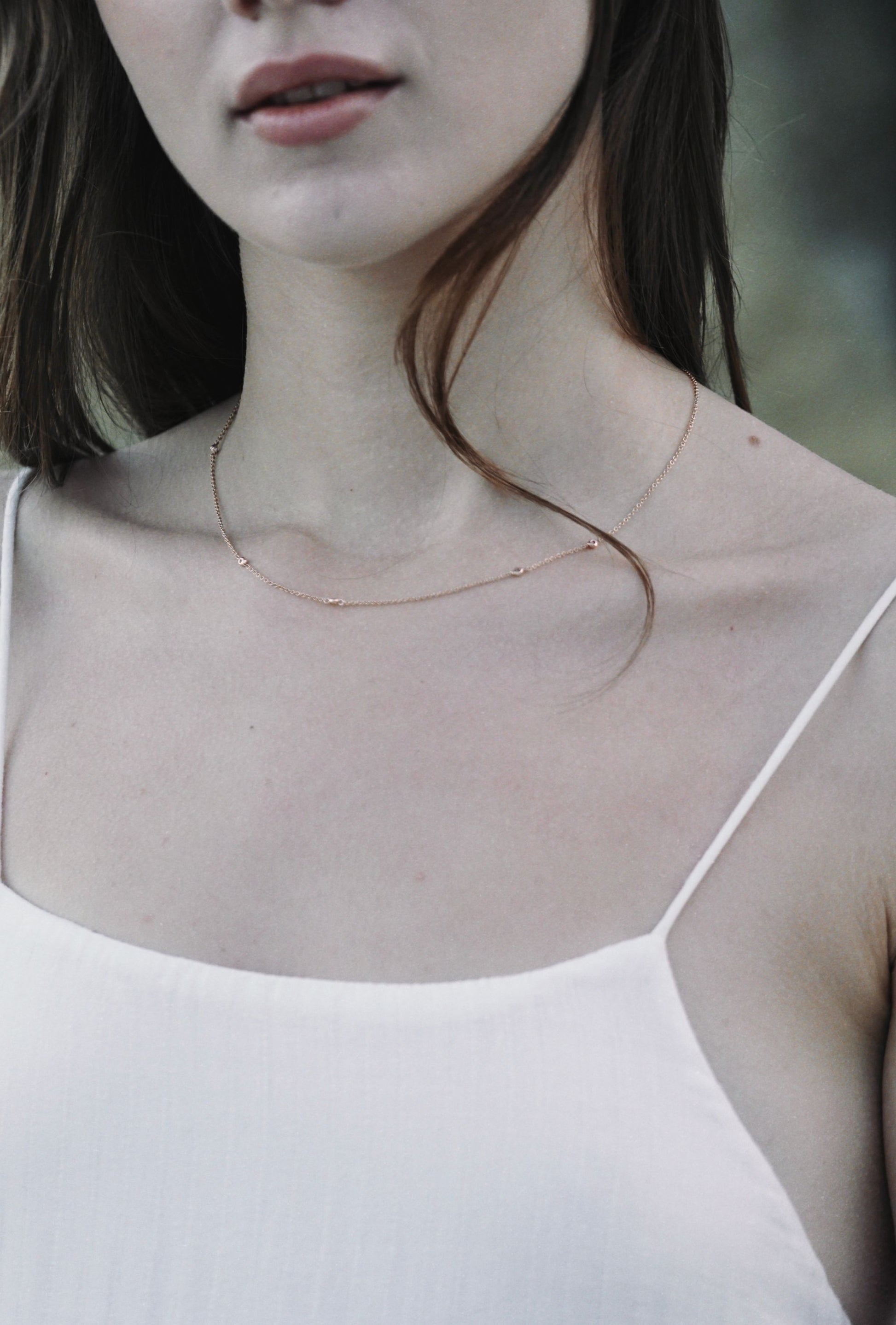 delicate diamond and gold necklace available from Thor Collective