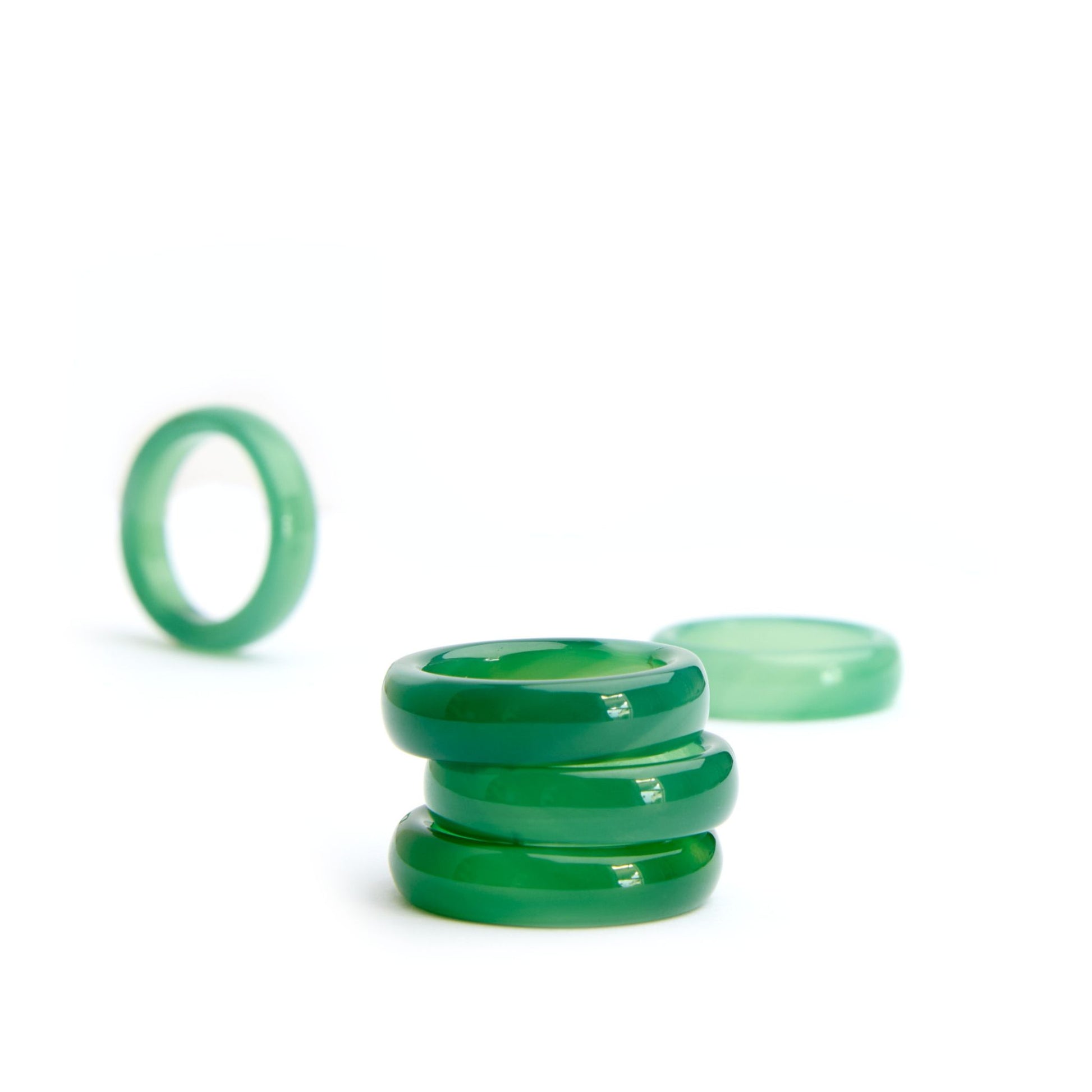 Green agate cigar band stacking ring shown upright and stacked